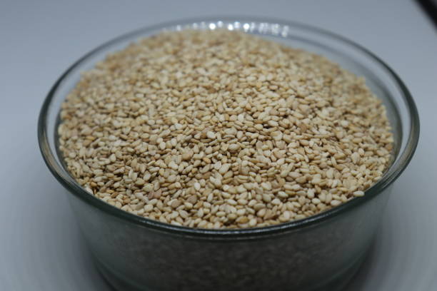istock Organic natural Til Gul OR Sesame seeds over white background 1272223997