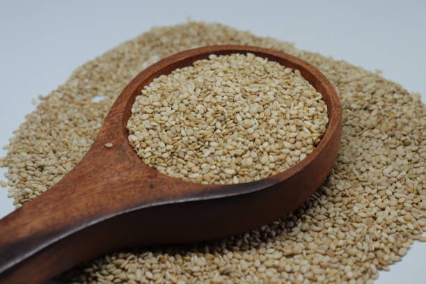 istock Organic natural Til Gul OR Sesame seeds over white background 1272224923