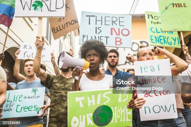 Activists Demonstrating Against Global Warming Stock Photo - Download Image Now - Protest, Climate, Climate Change
