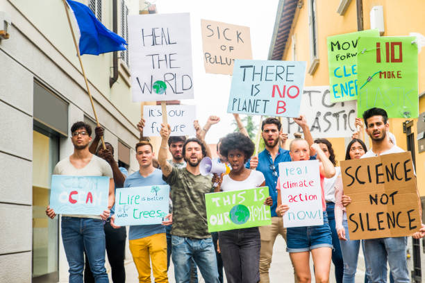 istock Activists demonstrating against global warming 1272227332