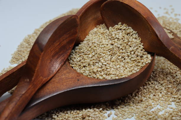 istock Organic natural Til Gul OR Sesame seeds over white background 1272227553