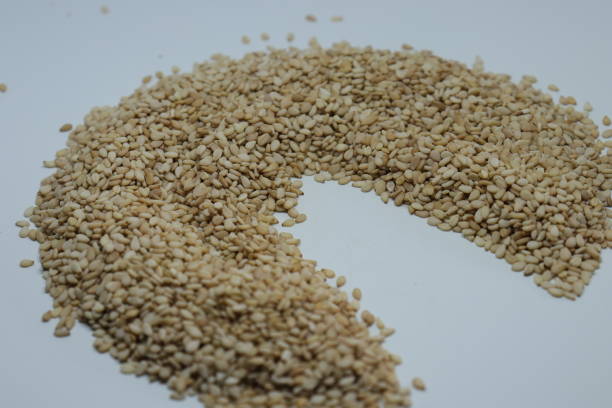 istock Organic natural Til Gul OR Sesame seeds over white background 1272228282