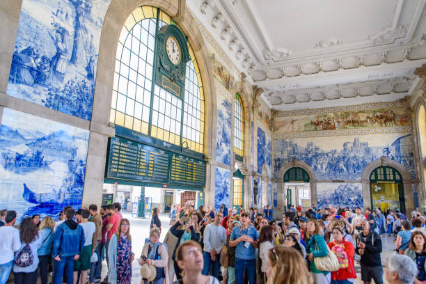 Interior of São Bento Railway Station, decorated with Azulejo panel, in Porto, Portugal stock photo