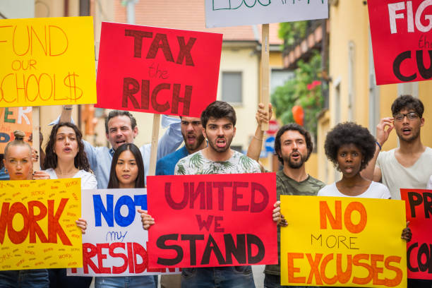 istock Activists demonstrating against social issues 1272231350