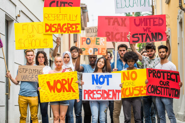 istock Activists demonstrating against social issues 1272231588