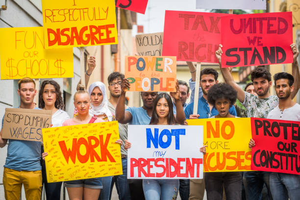 istock Activists demonstrating against social issues 1272231660