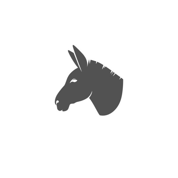 Donkey head icon Silhouette of a donkey's head in profile. burro stock illustrations