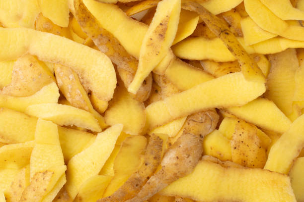 istock Pile of potato peel isolated on white background 1272233189
