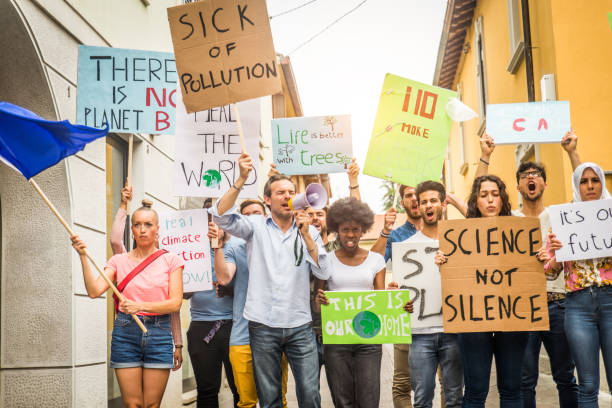 istock Activists demonstrating against global warming 1272233939