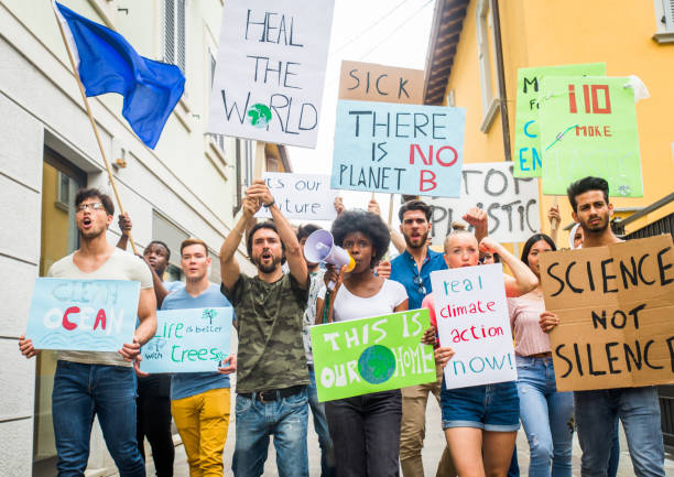 istock Activists demonstrating against global warming 1272234124