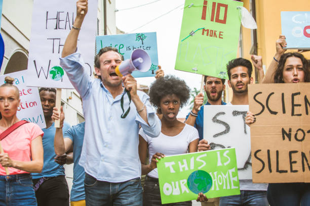 istock Activists demonstrating against global warming 1272234213