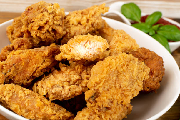 istock Breaded Fried Chicken Wings, Fingers and Drumstick 1272235622