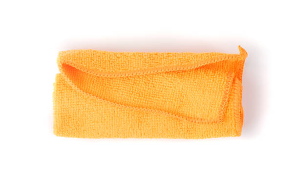 istock Orange Microfiber Cleaning Cloth Isolated on White Background 1272235667