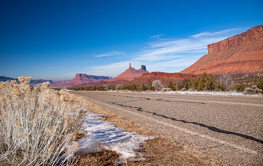 Road with view on Castle Rock in the Castle Valley near Moab, Utah