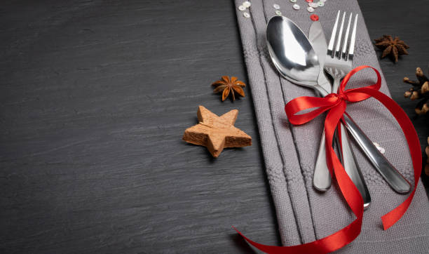 istock Christmas Dinner Table Setting with Cutlery and Winter Spices 1272239106