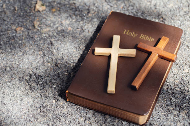istock Two cross is placed on top of the Bible. 1272244323