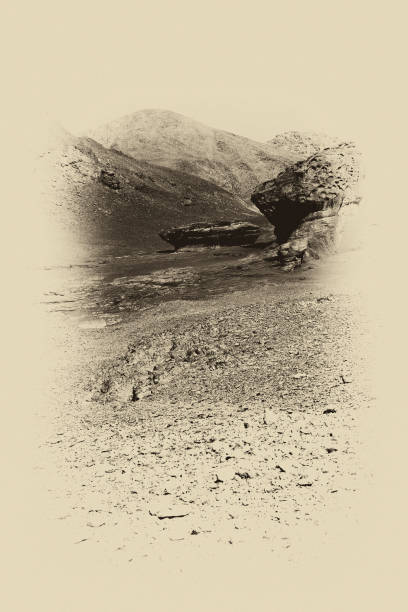Loneliness and emptiness of the rocky hills of the Negev Desert in Israel. Breathtaking landscape and nature of the Middle East. Black and white photo