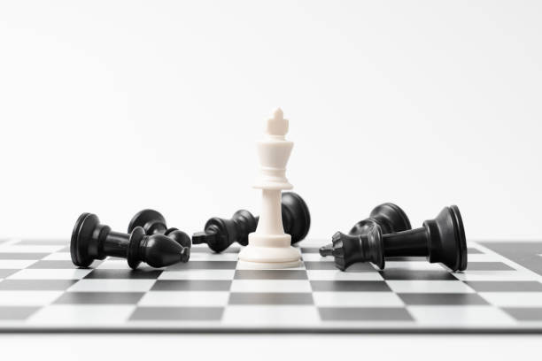istock The winner chess on a chessboard background 1272247324