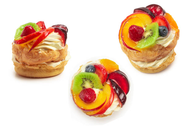 istock Home made cake with cream and fruit isolated 1272247389