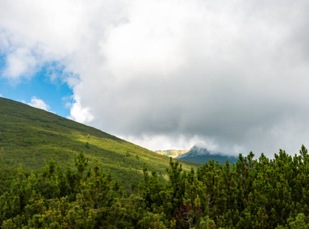 Bezbog peak in clouds. Pirin Mountain, Bulgaria, Europe.