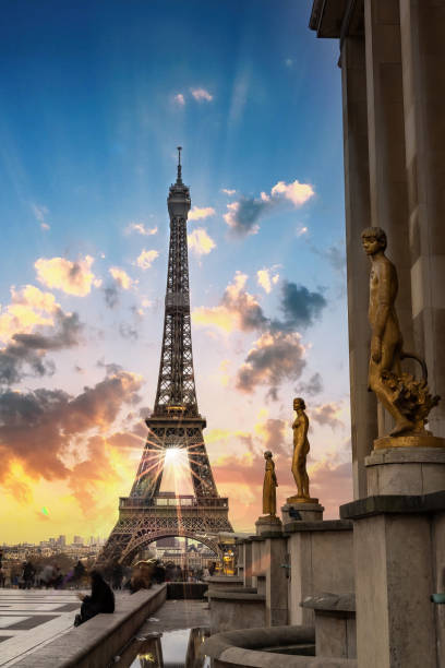 istock Sunset at Eiffel's tower with statues in Paris 1272251573