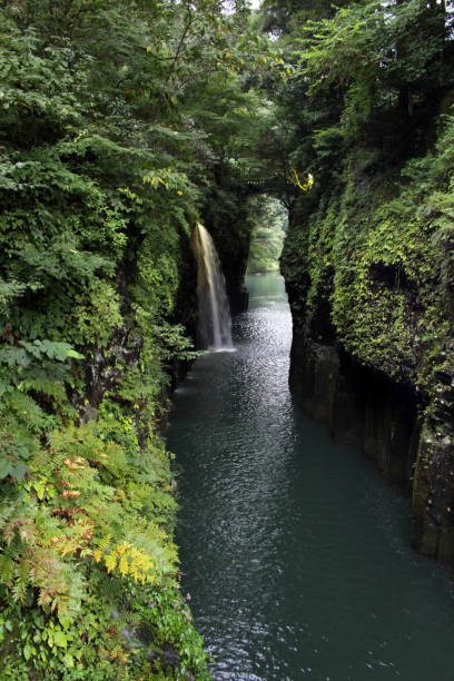 istock Waterfall and river of Takachiho Gorge 1272251630