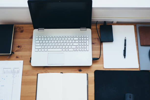 istock Office desk and supplies Empty workplace Top view 1272252993
