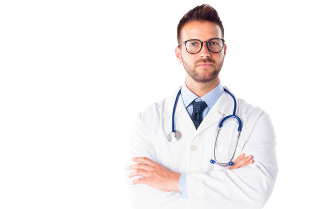 istock Male doctor portrait while standing at isolated white background 1272258412