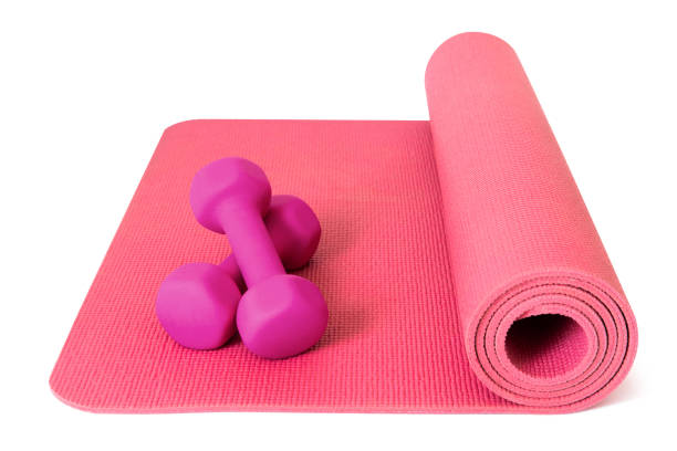 istock Pink Yoga Mat and dumbbells with clipping path. 1272262320