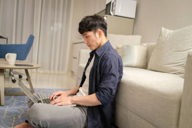 istock Asian man working at home 1272266720