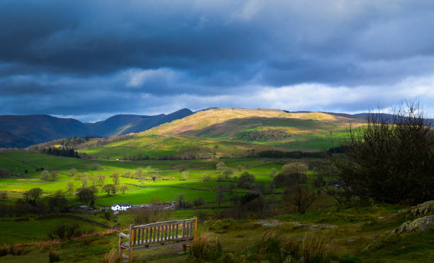 istock Green valleys with dark blue skies 1272270772