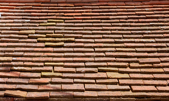Close-up of orange tiles on the roof