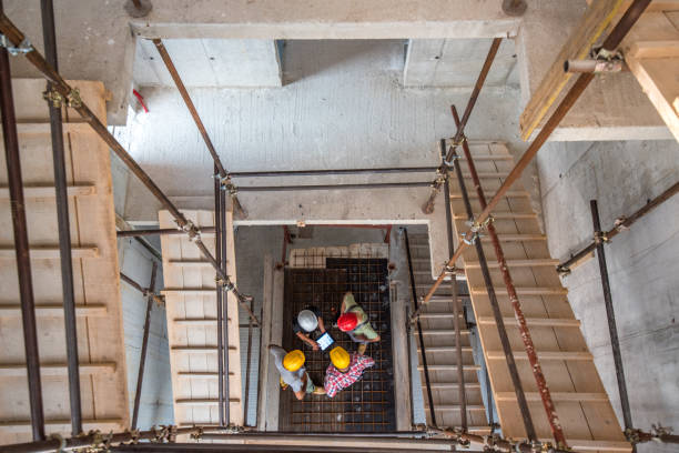istock High angle photo of scaffolding and construction workers 1272279403