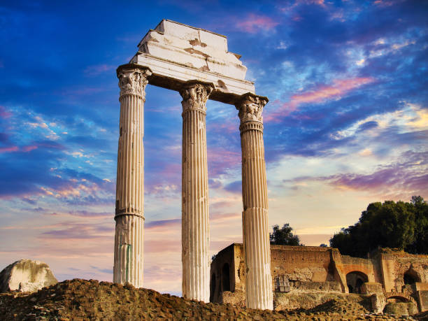 Roman Pillar Ruins at Sunset Roman temple pillar ruins in Rome, Italy. natural column stock pictures, royalty-free photos & images