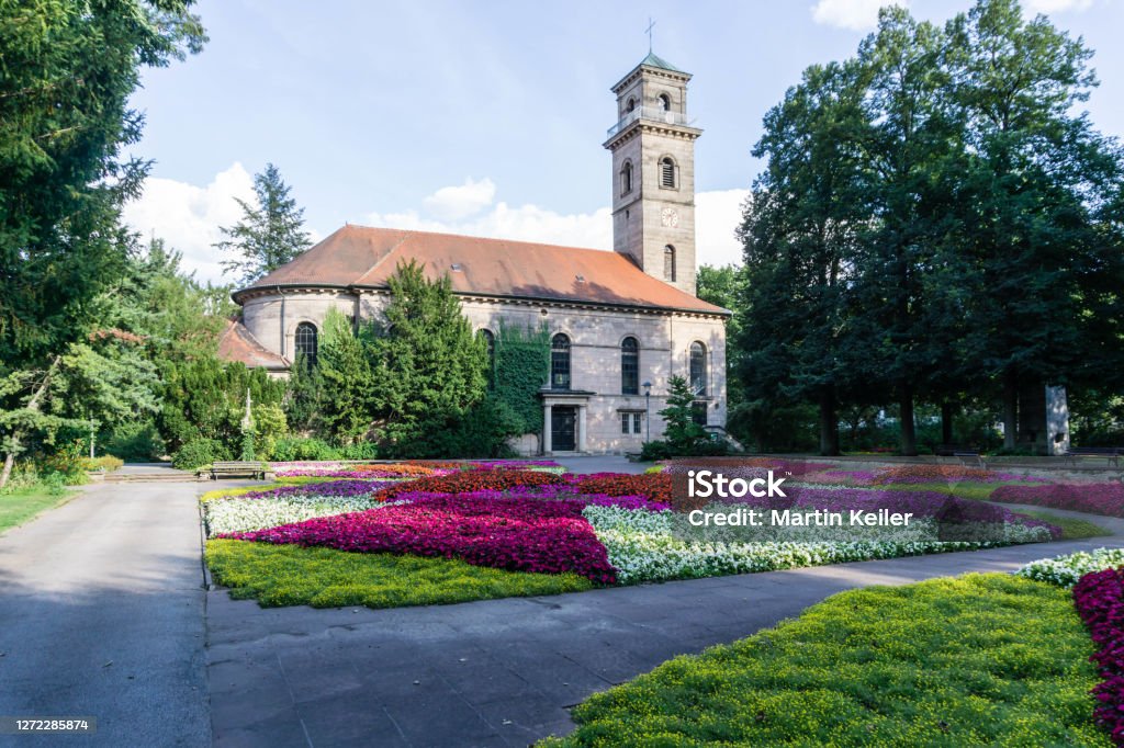 City park in Fürth with church at the blue sky, Bavaria Germany Fuerth Stock Photo