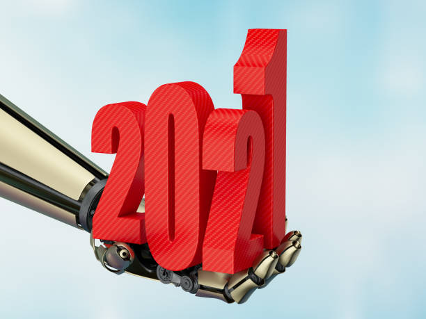 istock Robot's Hand Holding Red 2021 . New Year Concept 1272286086