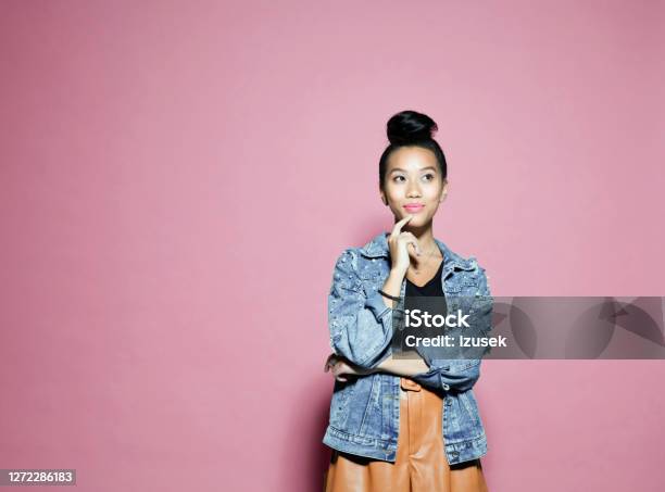 Smiling Businesswoman Standing On Pink Background Stock Photo - Download Image Now - One Woman Only, Pink Background, Contemplation