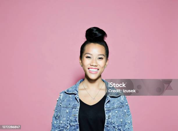 Confident Smiling Businesswoman On Pink Background Stock Photo - Download Image Now - Colored Background, Entrepreneur, Smiling