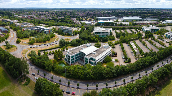 Reading, United Kingdom - June 07 2020:  An aerial photgograph of The Oracle  IT Company buildings on Thames Valley Park Drive
