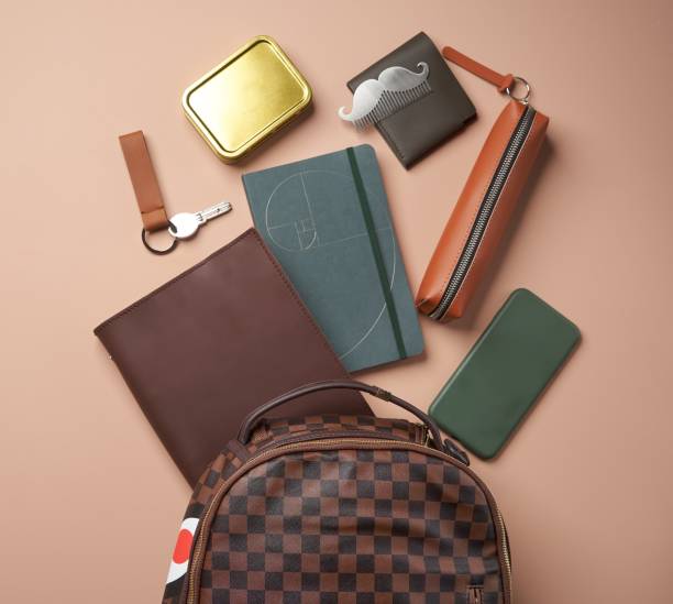 istock Men's backpack and accessories on pastel background 1272287300