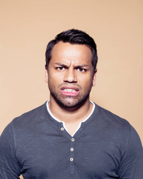 istock Confused entrepreneur over brown background 1272287410