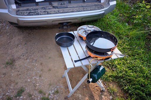 Overlanding camp stove setup with vehicle tailgate open