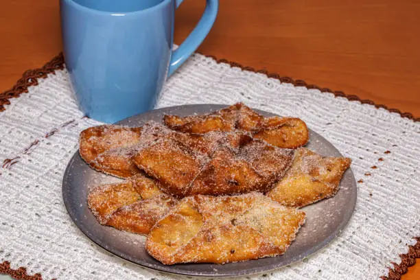 Photo of Fried sweet with sugar (pestiño) typical Spanish dessert from Andalusia and Extremadura