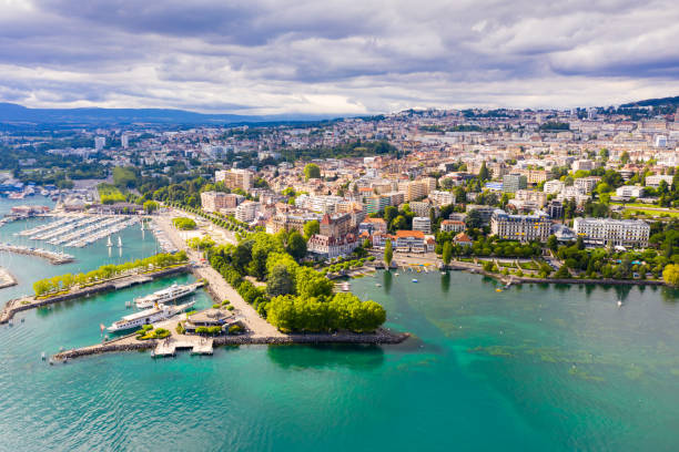 View from drone of Swiss town Lausanne Picturesque aerial view from lake Geneva of Swiss town of Lausanne geneva switzerland photos stock pictures, royalty-free photos & images