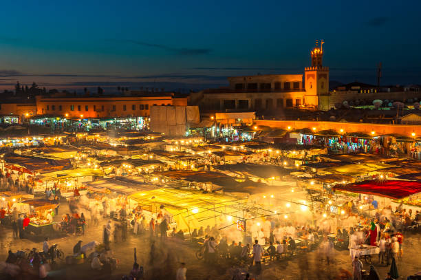 Jemaa el-Fnaa, square and market place in Marrakesh, Morocco Jemaa el-Fnaa, square and market place in Marrakesh, Morocco djemma el fna square stock pictures, royalty-free photos & images