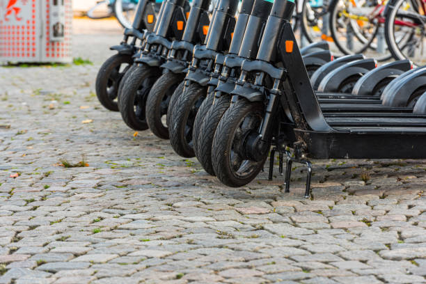 istock Many electric kickbikes for hire in a row 1272292110