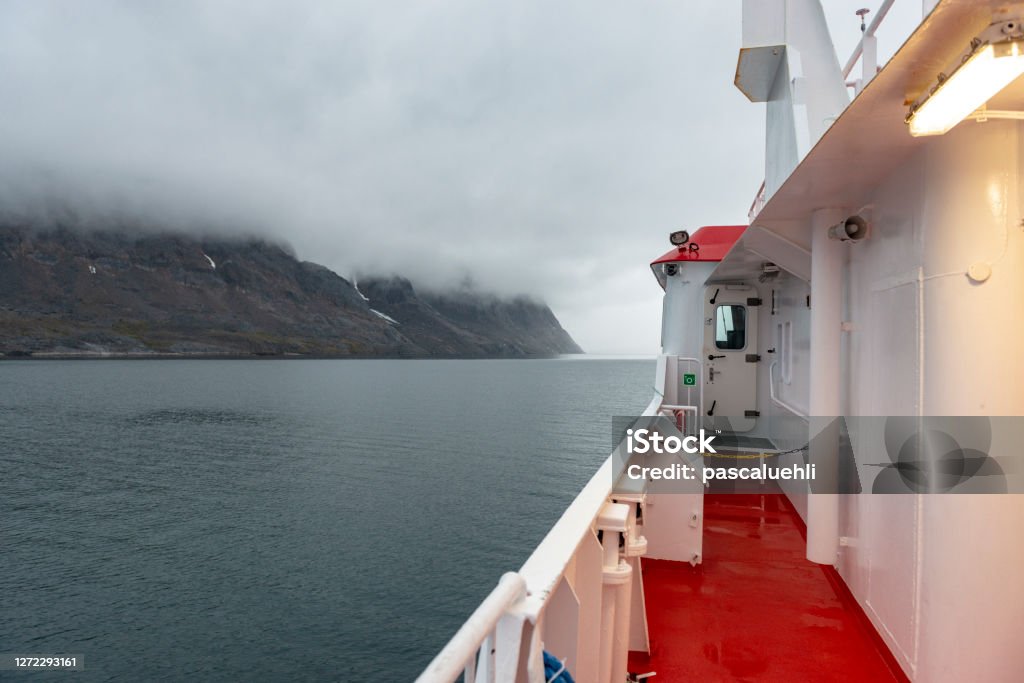 Greenland - September 4th 2020 , public transport ferry Sarfaq Ittuk Travel alongside the coastline of West Greenland with the public transport ferry. Stops from South to North harbours. Adventure Stock Photo