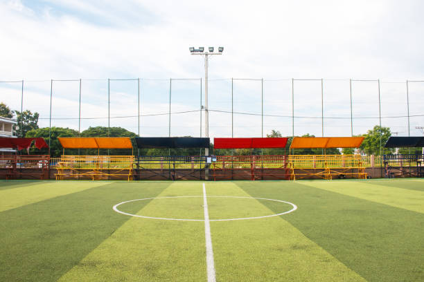 istock Soccer field with artificial turf in a stadium 1272293163