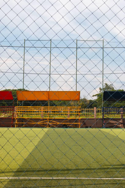 istock Soccer field with artificial turf in a stadium 1272293312
