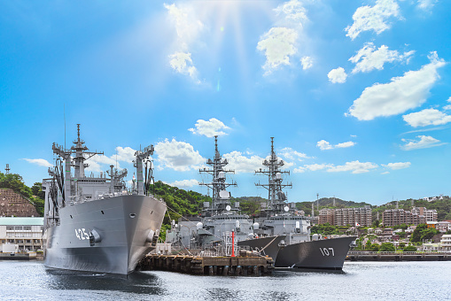 Aerial view of naval ship travelling in San Diego Bay, San Diego, California, USA.